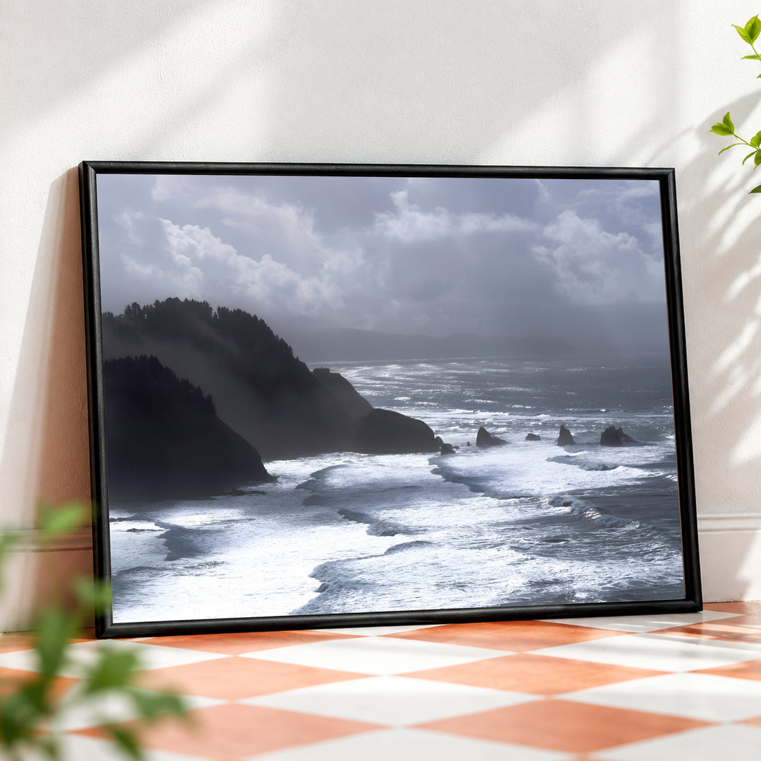 Framed ocean wall art featuring a coastal seascape photograph by Humans Among Us, displayed in a white frame for home decor.